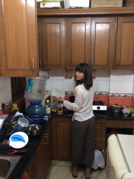 Me dabbling in a friend's kitchen in Delhi, grabbing the chance to be the chef and try my hand at a curry.